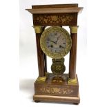 A 19TH CENTURY FRENCH GILT METAL MOUNTED ROSEWOOD PORTICO CLOCK with inlaid decoration, the 8-day