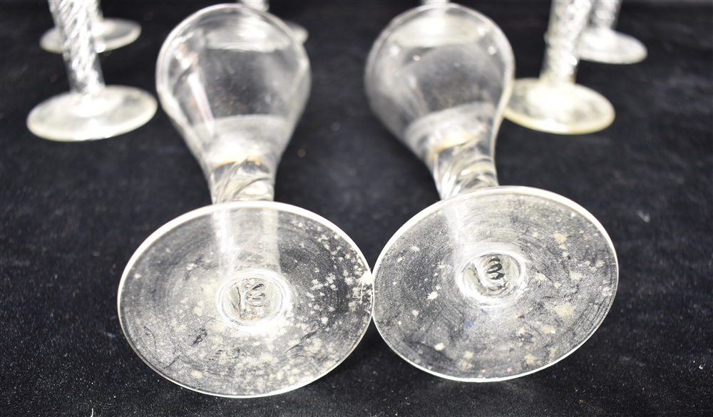 A SET OF EIGHT WINE GLASSES with trumpet shaped bowls and air twist stems, 15cm high Condition - Image 3 of 3
