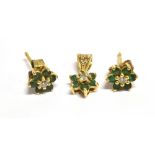 DIAMOND AND GREEN STONE FLOWER HEAD PENDANT AND MATCHING EARRINGS The pendant and earrings set