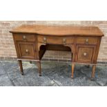 AN EDWARDIAN MAHOGANY BOWFRONT SIDEBOARD with crossbanded decoration, central drawer flanked by