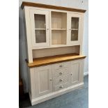 A CONTEMPORARY LIGHT OAK AND PART PAINTED DRESSER the upper section with pair of glazed doors,