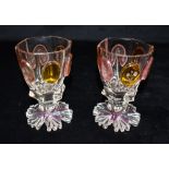 A PAIR OF BOHEMIAN FLASH CUT BEAKERS the hexagonal bowls with alternating oval rose and amber
