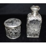 ANTIQUE WHITE METAL OVERLAY GLASS PERFUME BOTTLE AND VANITY JAR The large perfume bottle with finely