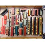 [OO GAUGE]. A HORNBY DUBLO ROLLING STOCK COLLECTION comprising four coaches, twenty-one wagons,