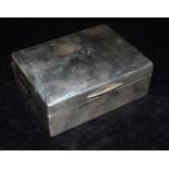 A SILVER BOX OF PLAIN FORM Monogrammed initials to the lid , side dated 15.12.27, inset with wood,