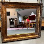 A LARGE GILT FRAMED MIRROR 84cm x 773cm overall, the mirror 61.5cm x 51cm Condition Report : good