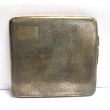 A SILVER CIGARETTE CASE of engine tuned pattern, the corner cartouche inscribed Bunty 20.11.39, gilt