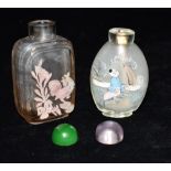 TWO CHINESE SNUFF BOTTLES: one inside decorated to each side with figures in a landscape, 7.5cm