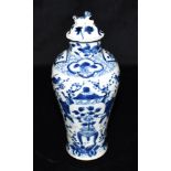 A CHINESE PORCELAIN LIDDED VASE OF BALUSTER FORM underglaze blue painted decoration of pair of