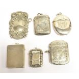 SIX VESTA CASES VARIOUS STYLES Four hallmarked silver, one white metal stamped sterling, one white