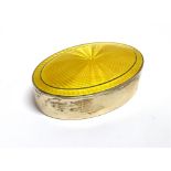 SILVER AND GUILLOCHE ENAMEL TRINKET BOX The oval trinket box fitted with a yellow sunburst Guilloche