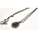 GEORG JENSEN BOXED SILVER PENDANT The flower pendant set with a garnet Boule with the pendant