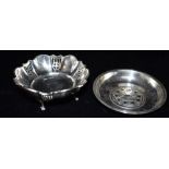 TWO ITEMS OF SILVER A footed silver bon bon dish with open work pierced pattern to the sides,