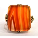 VINTAGE AGATE CLUSTER RING The ring set with an orange banded Agate stone measuring 1.8cm x 1.8cm