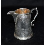 SMALL EDWARDIAN SILVER JUG The jug with chased pattern, scroll handle, hallmarked for London 1901,
