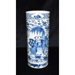 A CHINESE PORCELAIN VASE OF CYLINDRICAL FORM underglaze blue painted decoration of a pair of figures