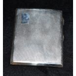 A MAPPIN AND WEBB SILVER CIGARETTE CASE The case with engine turned pattern and blank cartouche,