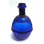 A HARDENS STAR HAND GRENADE FIRE EXTINGUISHER of blue glass, with liquid contents, 16cm high.