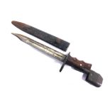 A BRITISH NO.7 MK 1/L BAYONET FIGHTING KNIFE with a 20cm blade and swivel pommel, in its painted