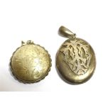 TWO VINTAGE LOCKETS A silver circular locket with floral chased all over pattern, faded hallmark,