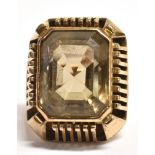 BROWN QUARTZ STATEMENT RING The single step cut stone measuring approx 1.7 x 1.5cm in a raised