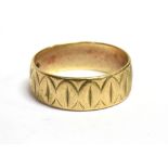 9CT GOLD PATTERNED BAND RING Rubbed hallmark, width 6mm, size P, weight 3.2g