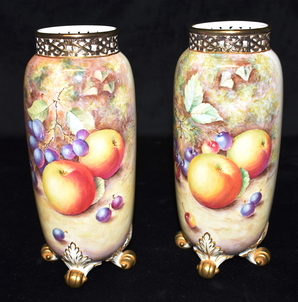 A PAIR OF ROYAL WORCESTER VASES of cylindrical form with reticulated gilt collars, shape G42, with