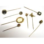 EIGHT VICTORIAN AND LATER STICK PINS (BOXED) The stick pins in a variety of materials to include a