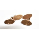 A PAIR OF VINTAGE 9CT ROSE GOLD CUFFLINKS The oval cufflinks featuring one half with monogrammed
