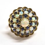OPAL AND BLUE SPINEL BOMBE RING The Bombe measuring 1.7cm in diameter on an unmarked yellow metal