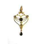 EARLY TO MID 20TH CENTURY PENDANT The pendant in open work Art Nouveau style, set with seed pearls