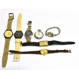 A COLLECTION OF SEVEN WATCHES A ladies white metal cased open faced pocket watch, case measurement