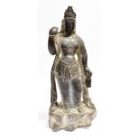 AN INDO-CHINESE CARVED BASALT FIGURE OF GUANYIN 48cm high Condition Report : neck broken and re-