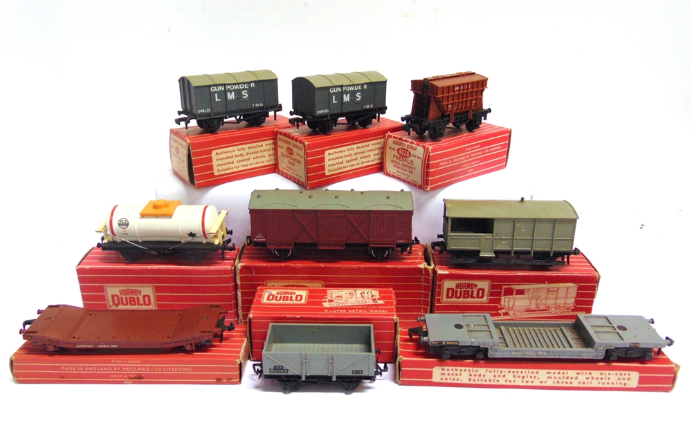 [OO GAUGE]. NINE HORNBY DUBLO WAGONS comprising two No.4313, Gunpowder Vans (both repainted L.M.S.