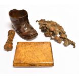 [TREEN] A CARVED FRUITWOOD BOOT 11CM LONG, a burr wood card case, a carved study of leaves and