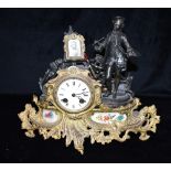 A FRENCH SPELTER AND GILT METAL FIGURAL MANTLE CLOCK the 8-day Marti & Co movement striking on a