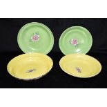 FOUR CHINESE BOWLS WITH FLORAL DECORATION two with yellow to interior, two green, printed seal