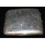 A SILVER CIGARETTE CASE The case with all over engraved pattern, monogrammed cartouche, gilt