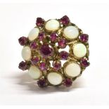 BOMBE RING Purple sapphire and white opal Bombe ring, measurement 2.5cm, shank unmarked, ring size