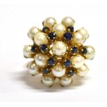 SAPPHIRE AND CULTURED PEARL BOMBE RING Bombe measurement 2.1cm diameter, shank unmarked, ring size N