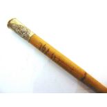 MILITARIA - A ROYAL BERKSHIRE REGIMENT BAMBOO SWAGGER STICK with a pressed metal alloy terminal,