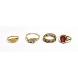 AN ASSORTMENT OF LADIES DRESS RINGS One oval mixed cut synthetic ruby set in 9ct yellow gold, ring