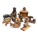 A COLLECTION OF BLACK FOREST BEARS including a figural jar with hinged lid, desk stand with inkwell,