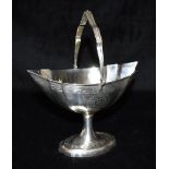 GEORGIAN IRISH SILVER BON BON DISH A superb piece of Irish silver of helmet shaped form with