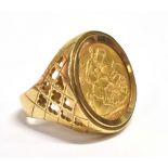 FULL SOVEREIGN COIN SET GENTS RING Sovereign coin dated 1910, spectacle set in 9ct yellow gold