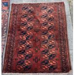 A RED GROUND OPEN CAMEL BAG/WALL HANGING 110cm x 180cm; together with a red ground Bokhara rug