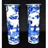 A PAIR OF CHINESE VASES of cylindrical form with flared rims, underglaze blue painted decoration