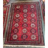 A RED GROUND CARPET 206cm x 310cm