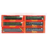 [OO GAUGE]. SIX HORNBY S.R. COACHES including three bogie luggage vans, all olive or dark green