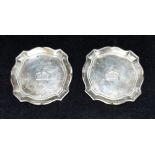 PAIR OF SILVER TRAYS 8cm diameter with cartouche shaped edges and decorated with Ducal coronet in